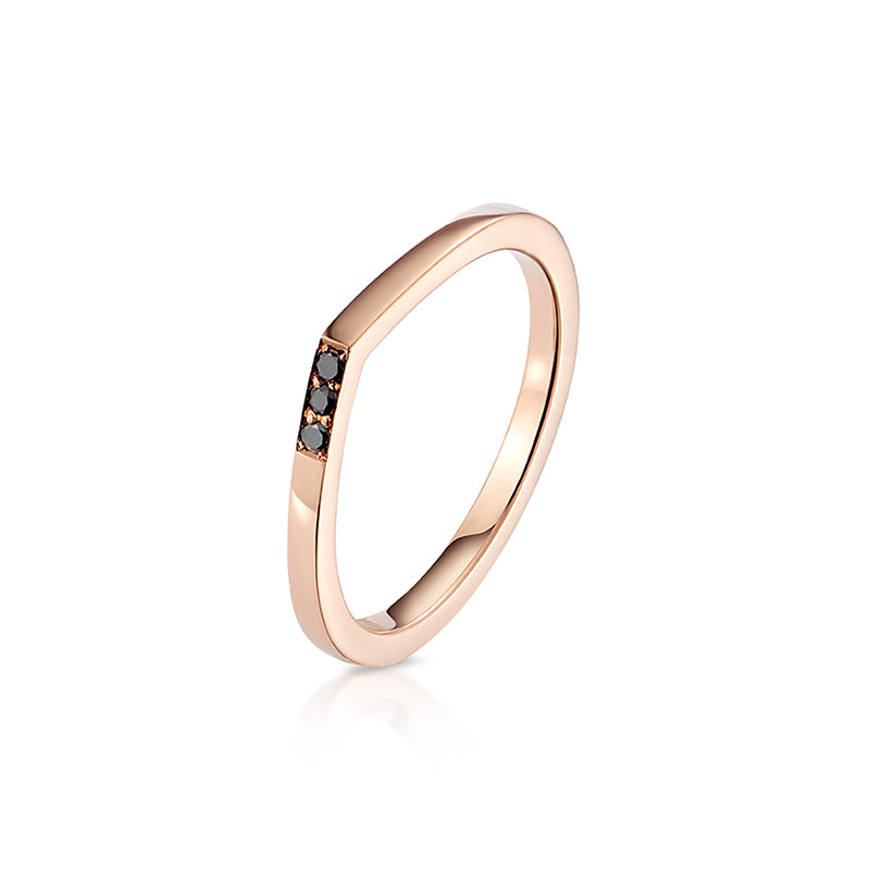 Modern and contemporary single raindrop ring in 18ct rose gold set with three brilliant cut black diamonds