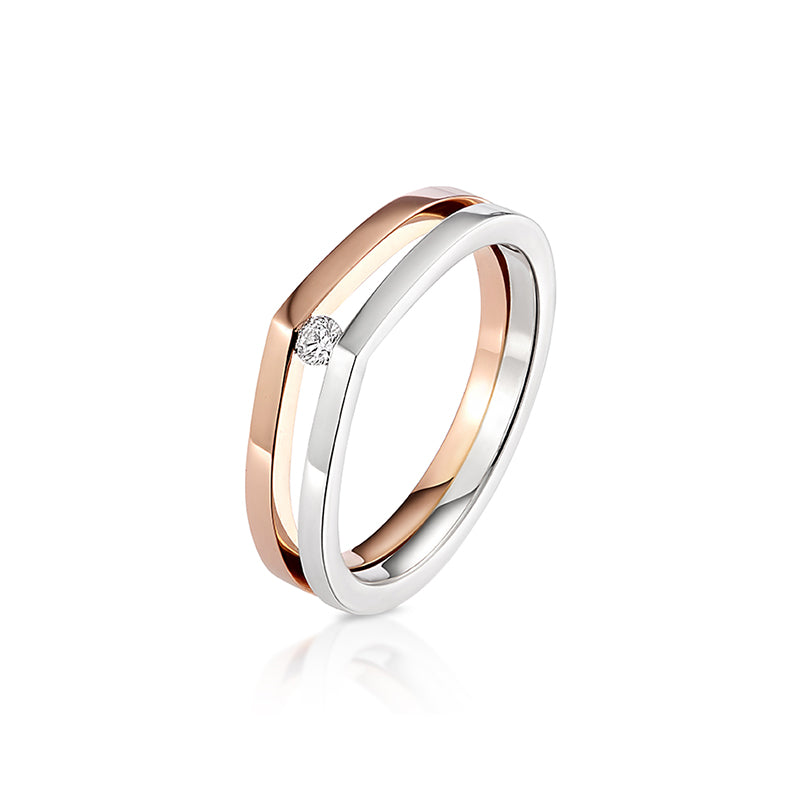 Modern and contemporary 18ct rose gold and silver raindrop ring set with a round brilliant cut diamond 